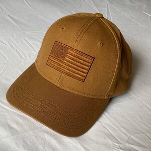 This is a Tan/light brown hat made by H3 Headwear, OS fits all!